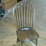 Oak chair, arch spindle back walnut colour.